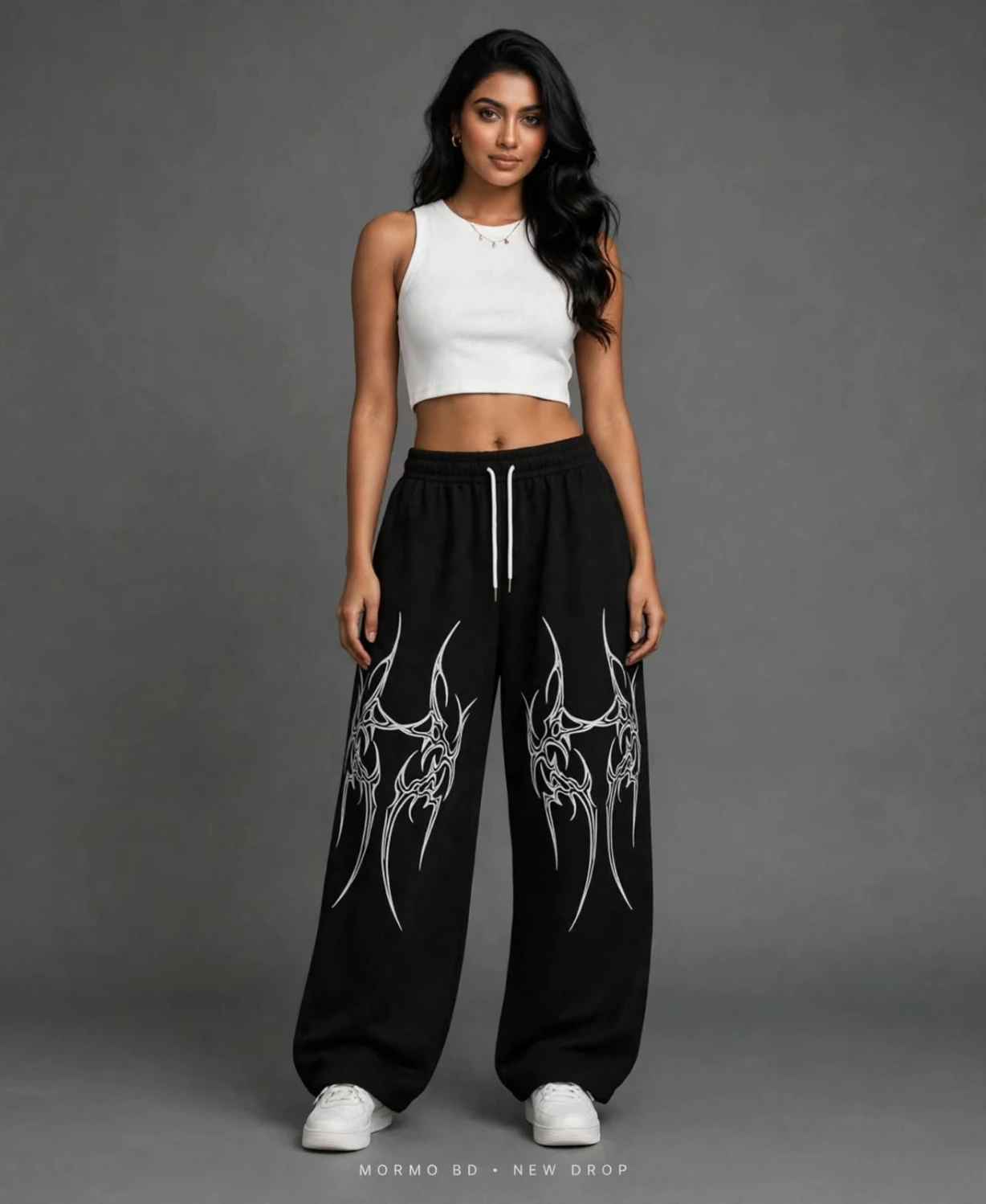 Black wide-leg sweatpants with white tribal graphic print