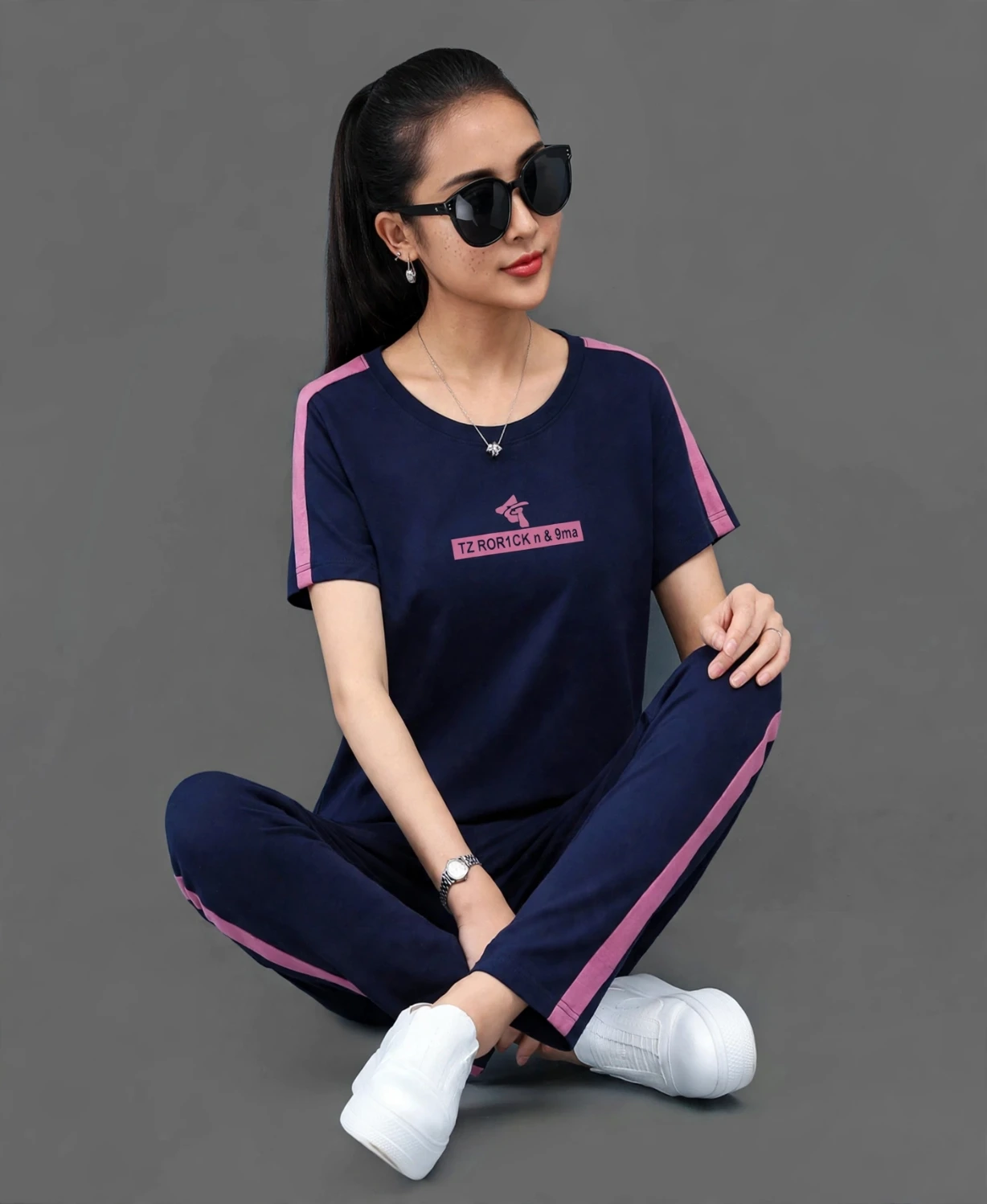 Navy blue side stripe tracksuit set with logo tee and cropped pants